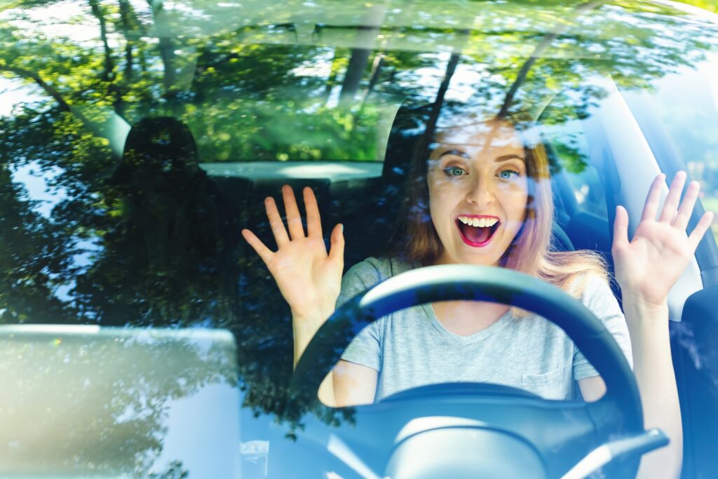 Woman driving with no hands