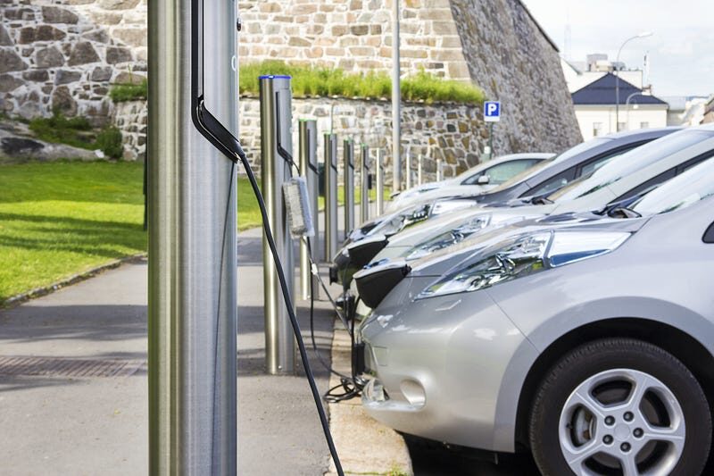 Cars parked in a charging parking lot