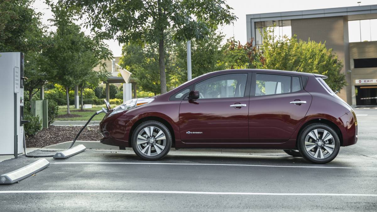image Electric vehicle charging in parking lot