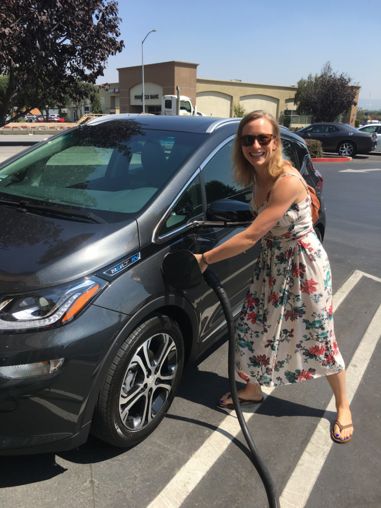 Lady charging car