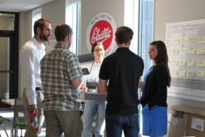 People standing in hallway