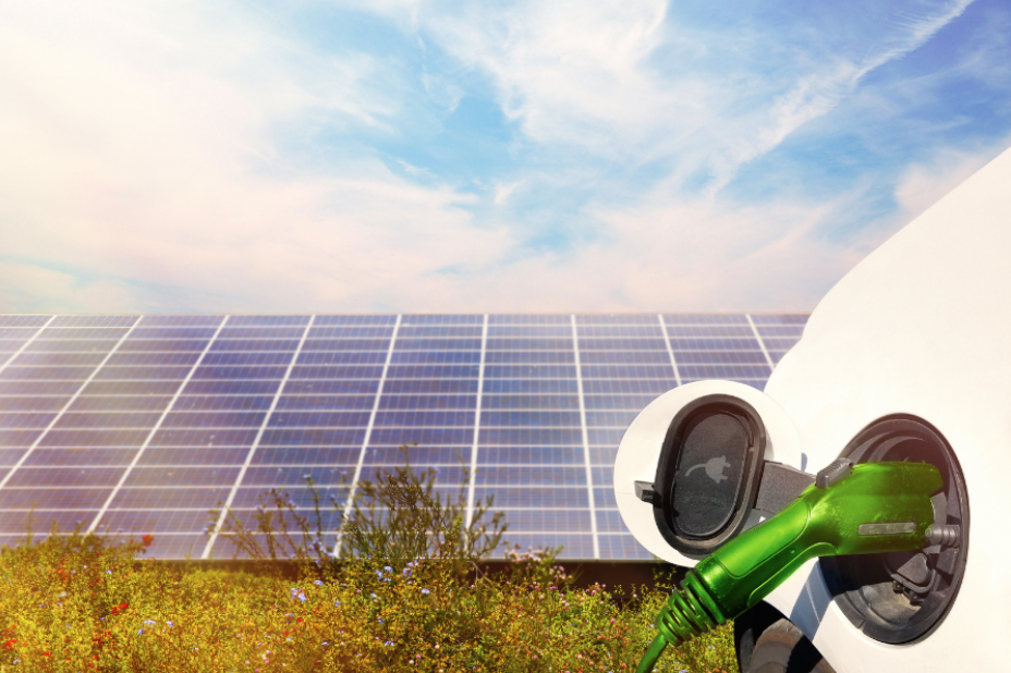 image EV charging with solar panels in background